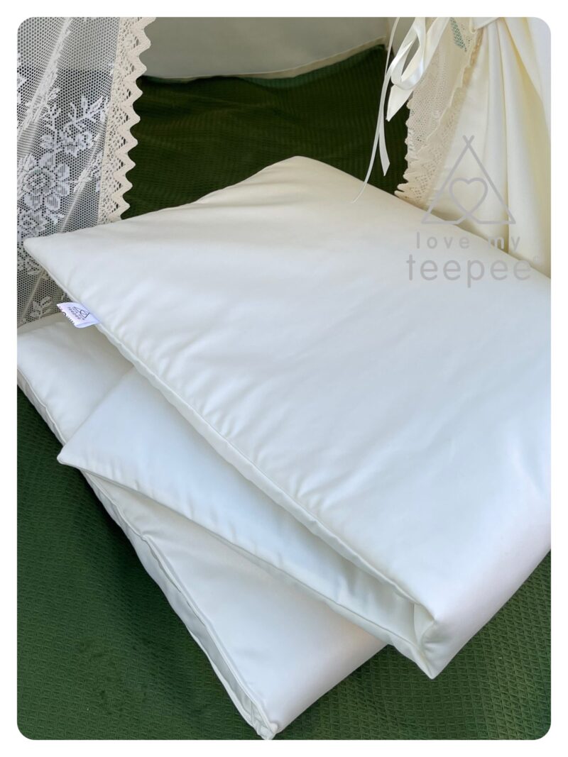 Close-up of the ivory padded floor mat and lace trim detail, styled to coordinate with the classic ivory teepee.