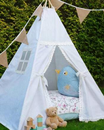 Handmade personalised kid’s teepee in plain white with lace-trimmed doors tied back, bunting garland above, and interior styled with a floral floor mat and coordinating Tweety Bird cushion for a soft nursery look.
