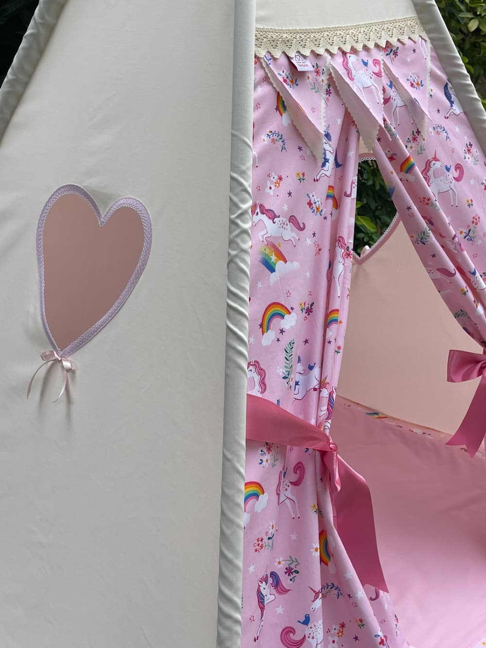 Personalised pink unicorn kids teepee tent showing heart-shaped side window