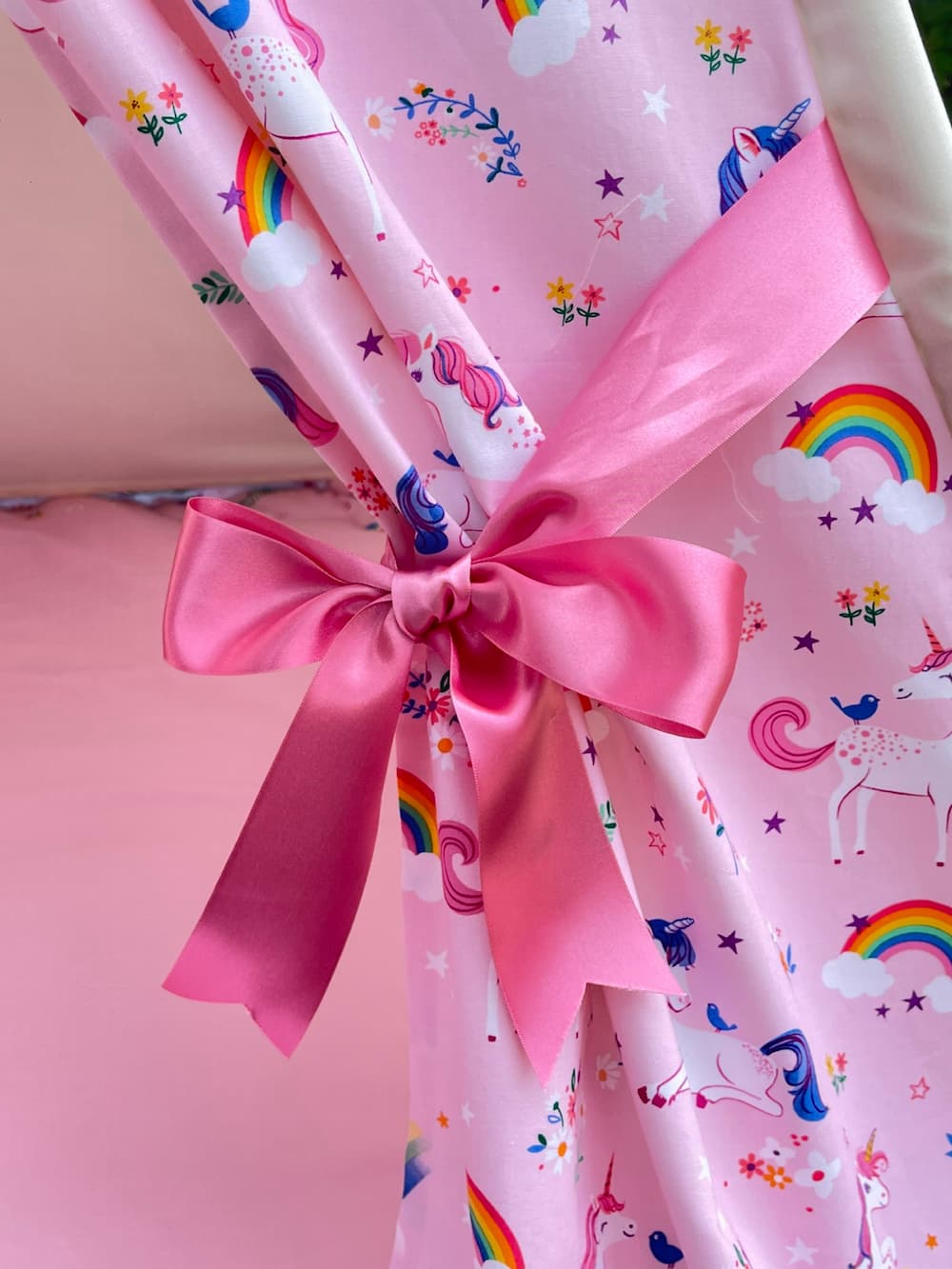 Pink satin ribbon tie back on personalised pink unicorn kids teepee tent